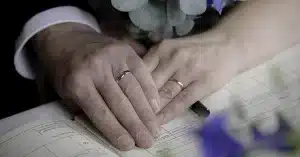 Wedding Bands, holding hand, signing registry